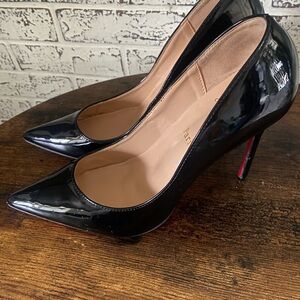 Christian Louboutin
So Kate Patent Pointed-Toe Red Sole Pump